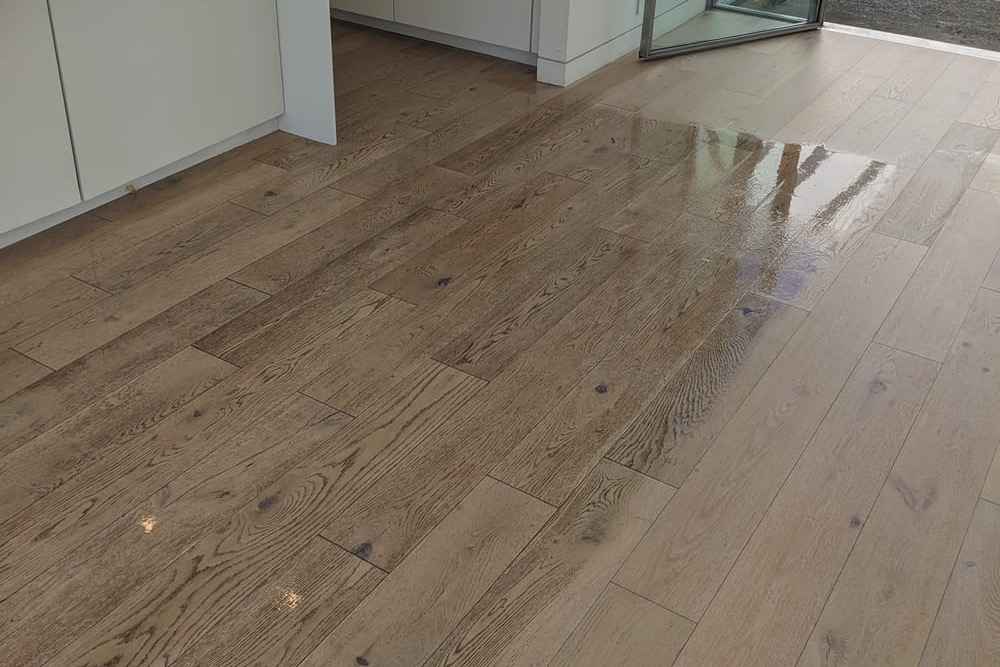 Restored hardwood floor with a uniform satin sheen after cleaning in a Mill Valley home
